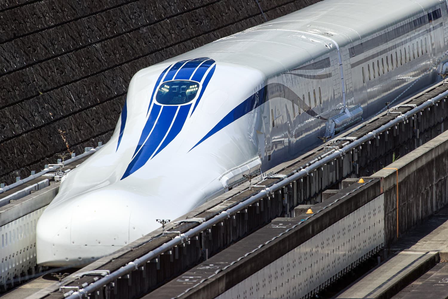 JR Central Series L0 SCMAGLEV train in the U-shaped guideway — superconducting maglev technology